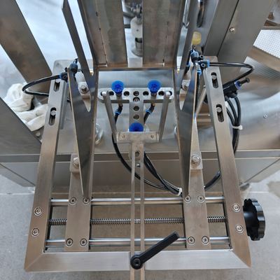 Bag pickup station â robotic arm taking a premade pouch